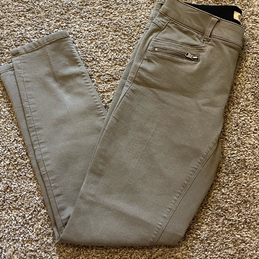 These are a gently used pair of gray jeggings